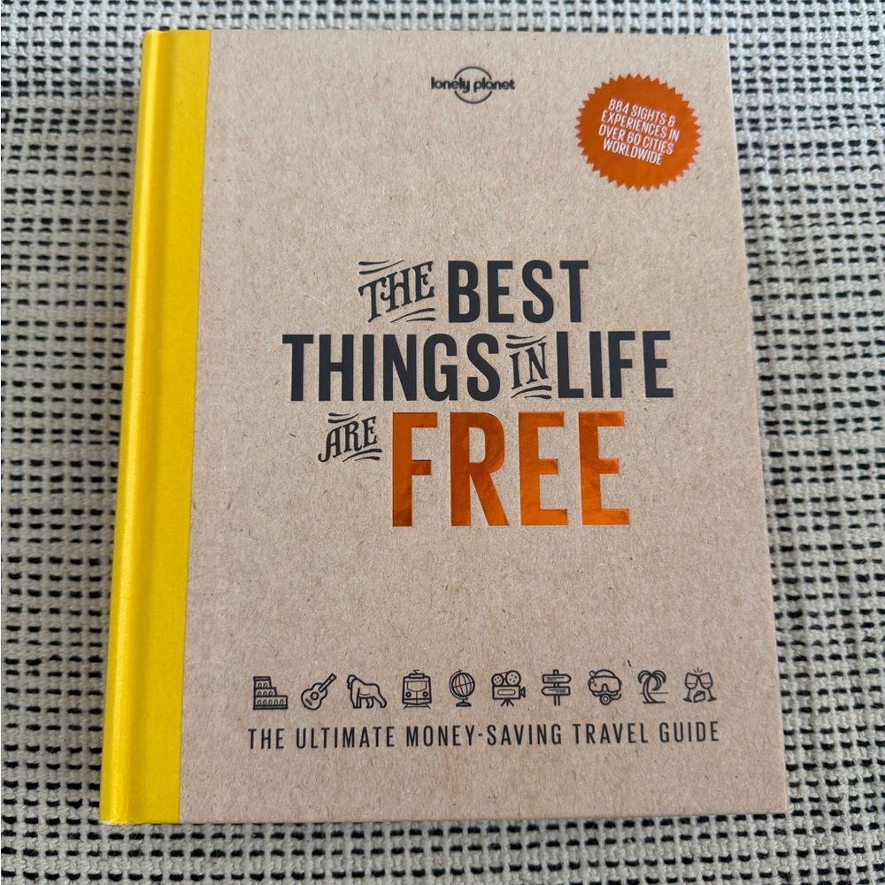 Lonely Planet Kraft Travel Guide with Yellow Spine - Bold Black & Orange Text